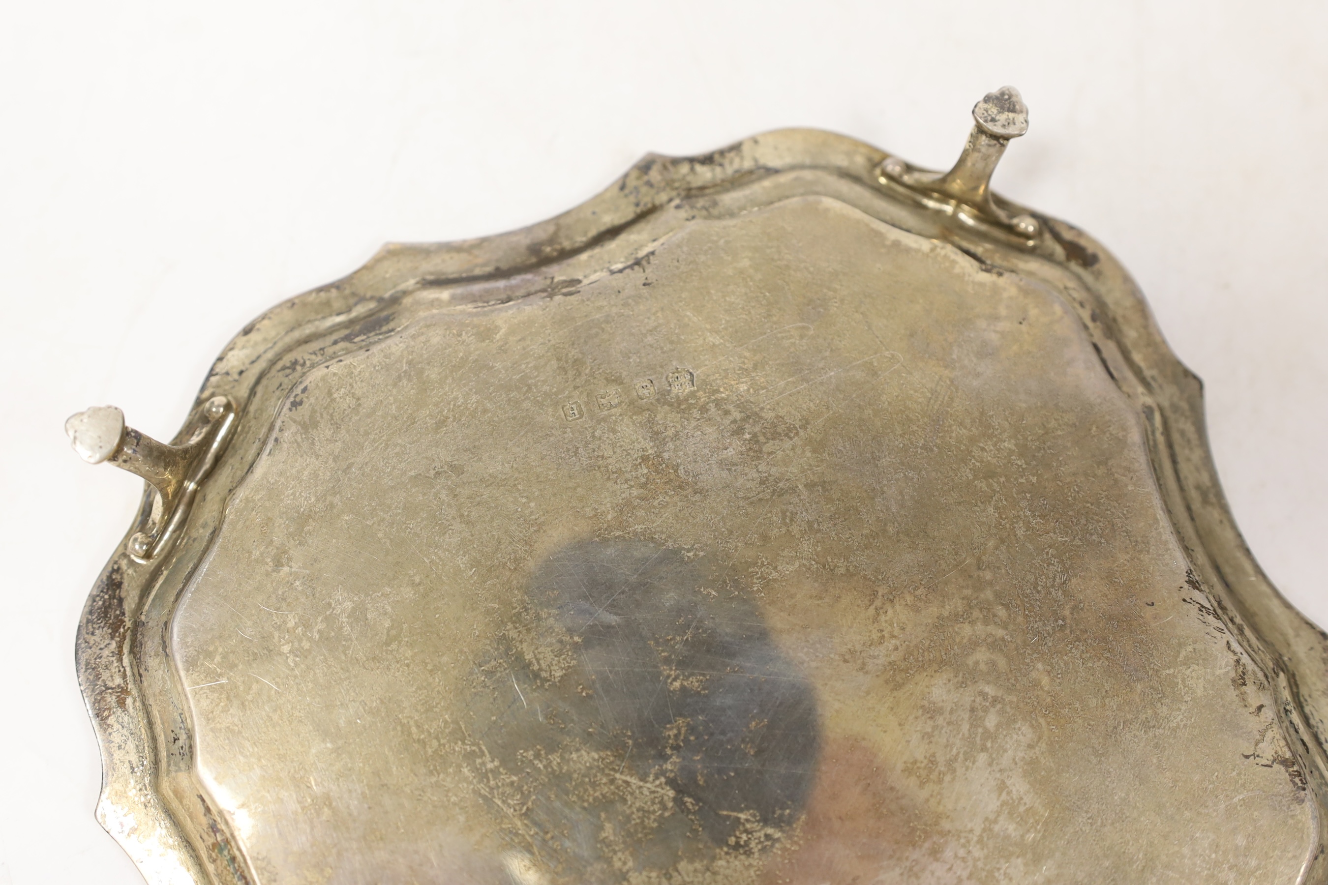 A George V silver waiter, with engraved inscription, Barker Brothers Silver Ltd. Birmingham, 1930, 18.1cm, 8.5oz.